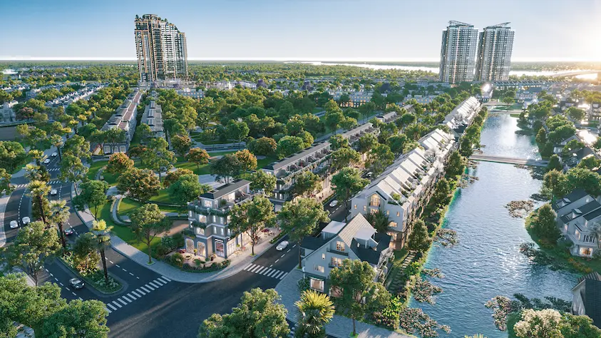 “Phối cảnh khu đô thị sinh thái ven sông với nhiều cây xanh và nhà ở hiện đại, minh họa định hướng phát triển và tiến độ ecopark Ninh Bình.”